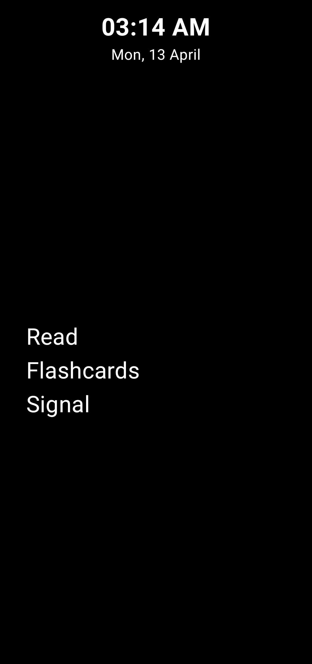 Minimo launcher has white text on a black background with the apps 'Read', 'Flashcards', and 'Signal' showing under the time.